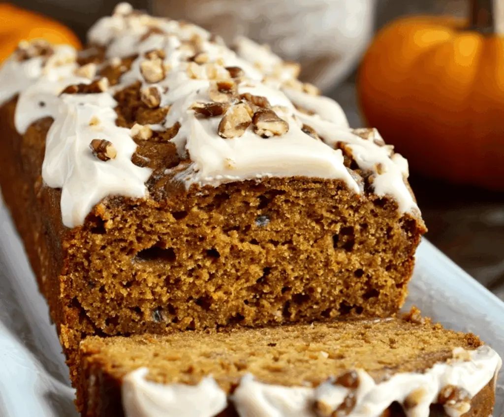 Delicious homemade pumpkin banana bread with a golden crust and moist texture, perfect for fall baking and autumn treats